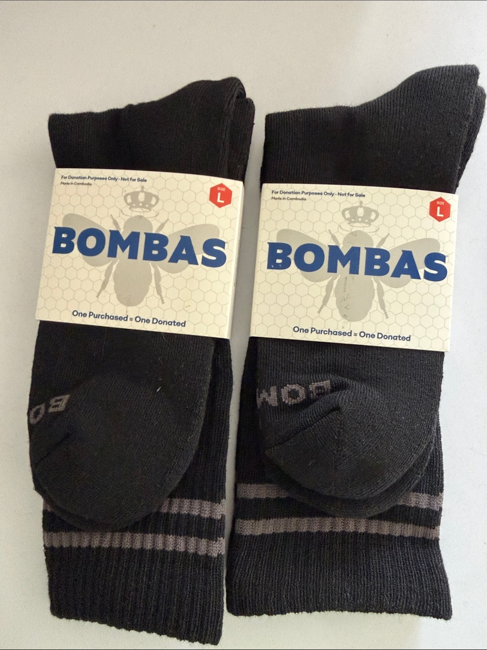 New Bombas Men's Black Crew Athletic Socks with Gray Stripe Accents. Size large.